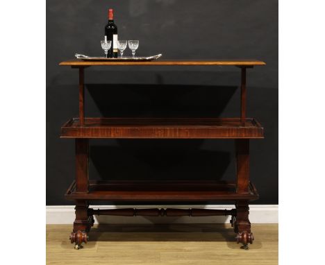 An early Victorian mahogany metamorphic buffet serving table, rectangular top above two further plateaux, rectangular support