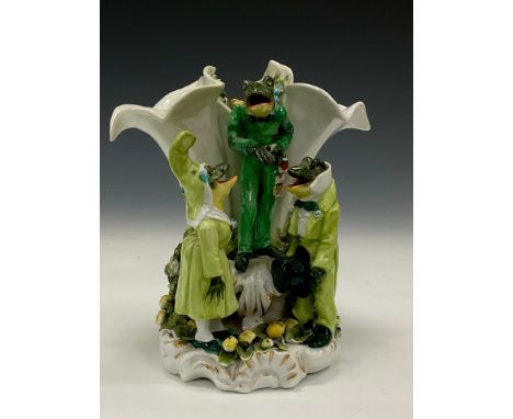 A 19th century continental  figure group trumpet vase of talking frogs, Sitzendorf mark to base, 16cm high