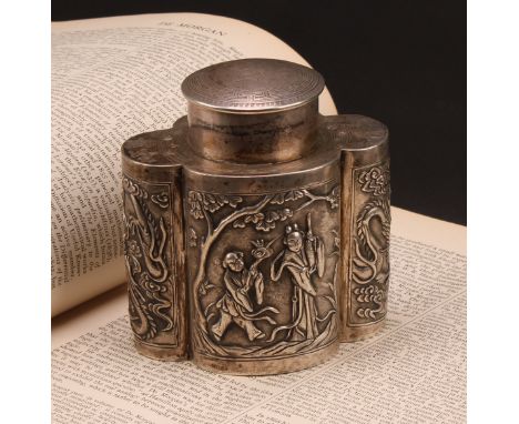 A Chinese silver lobed oval tea caddy, chased in the Cantonese taste with figures and dragons, push-fitting cover, 10.5cm wid
