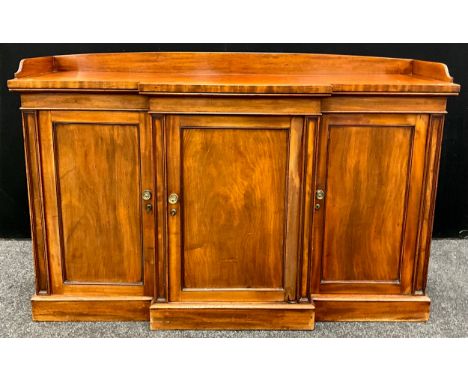 A Regency mahogany chiffonier sideboard, three-quarter galleried top, break-centre front with centre door enclosing a cellare