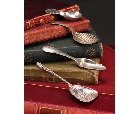 A George III silver caddy spoon, fluted bowl, 10cm long, Solomon Hougham, London 1807; etc (4), 40g