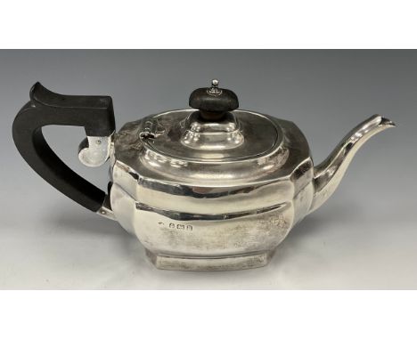 A George V silver bachelor's teapot, ebony handle and thumb piece,  K &amp; L, Birmingham 1932, 22.5cm long, 13.5ozt gross