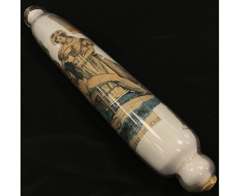 A 19th century glass rolling pin, internally decorated with hand coloured cuttings and pictures, including The Sailors Return