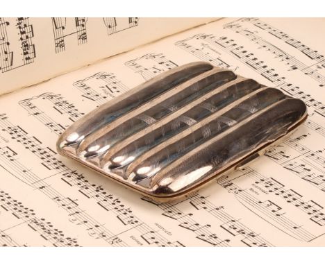 A George V silver cigar case, the hinged cover with machine etching and enclosing a gilt interior, Birmingham 1917, 205g gros