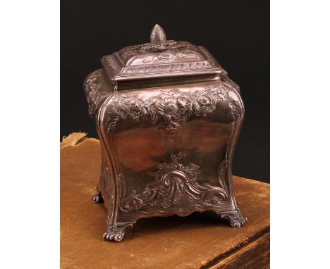 A George II silver bombe shaped tea caddy, chased in the Rococo taste with flowering swags and leafy scrolls, 13.5cm high, Pi