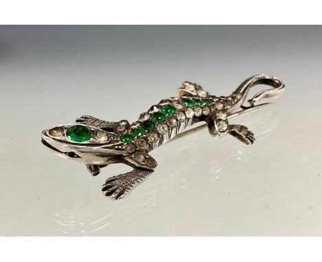 A continental 935 silver paste Lizard or Salamander brooch, with emerald and diamond effect paste stones, stamped 935, indist