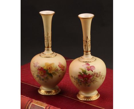 A pair of Royal Worcester blush ivory bud vases, shaped number 1661, 16.3cm high. printed marks, date code 1908 (2)