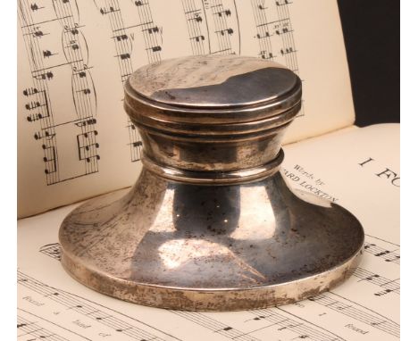 A large George VI silver capstan inkwell, hinged cover, spreading base, 13cm diam, Birmingham 1937