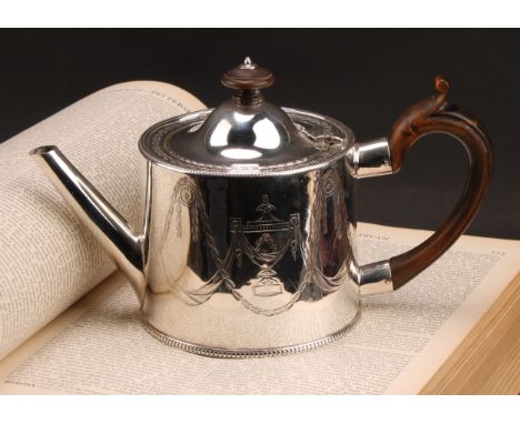 A George III silver drum teapot, bright-cut engraved in the Neo-Classical taste with urns, swags and paterae, beaded borders,