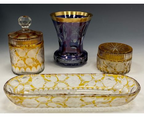 19th century Bohemian coloured engraved glass including lidded jars, vase and trinket tray, 22cm long (4)