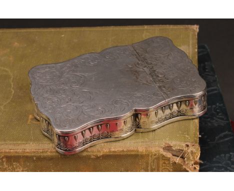 A 19th century silver coloured metal serpentine twin-section table snuff box, hinged covers engraved with scrolling foliage, 