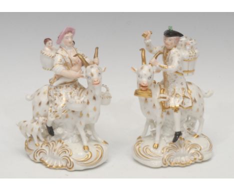 A pair of Derby porcelain models, of the Welch Tailor and his Wife, he astride the goat, carrying the tools of his trade, and