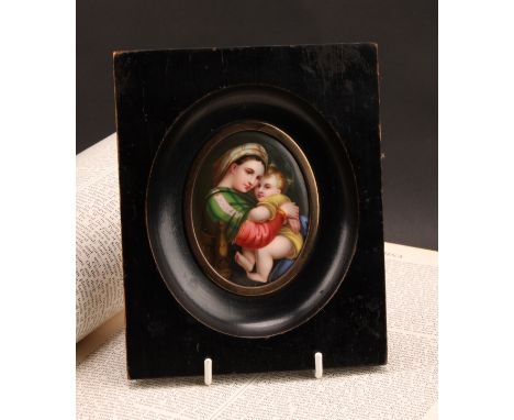 A Continental porcelain plaque, painted after Raphael with the Madonna della Seggiola, oval, 7.5cm x 6cm, framed as a portrai