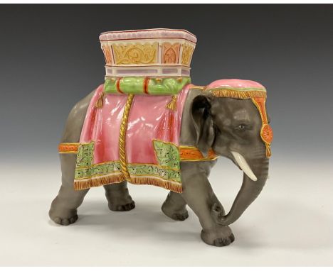 A Royal Worcester elephant vase, hand painted in pink, green and gilt detail, incised signature, printed marks, c.1874, 20cm 