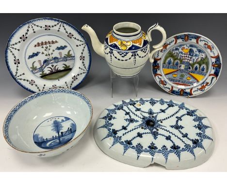 18th century Delftware ware including a Dutch Delft polychrome plate, painted with a garden scene and stylised ornamental poo