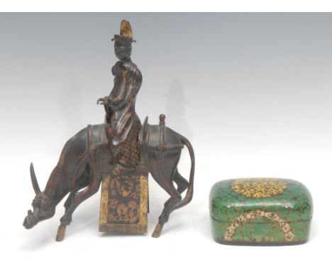 A Chinese bronze animal zun or ritual vessel, cast as a scholar seated on a horse, picked out in gilt, 25cm high overall, 19t