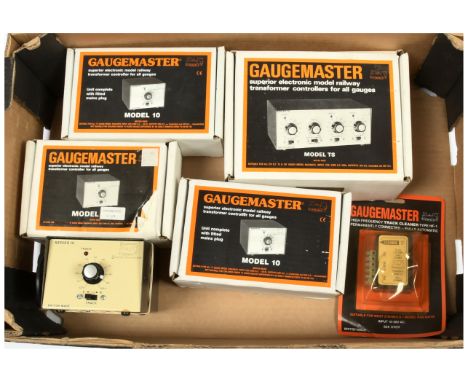 Gaugemaster a boxed and unboxed group of various controllers to include Series Model TS and others (see photo). Conditions ar