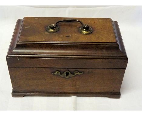 An early 19th Century mahogany sarcophagus shape Tea Caddy, the interior fitted with two covered containers with brass handle