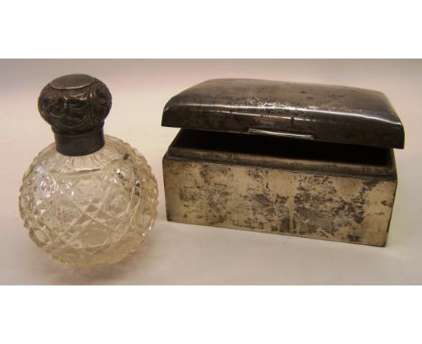 A late Victorian cut glass globe Scent Flask with silver cover, Birmingham, 1898, and a silver oblong cigarette box.