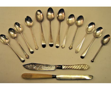 A collection of twelve various Teaspoons, silver bladed and mother of pearl knife and silver bladed knife with bone handle.