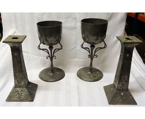A pair of Continental Art Nouveau pewter ornamental Goblets the stems formed as flowering branches on a circular base.  11" (