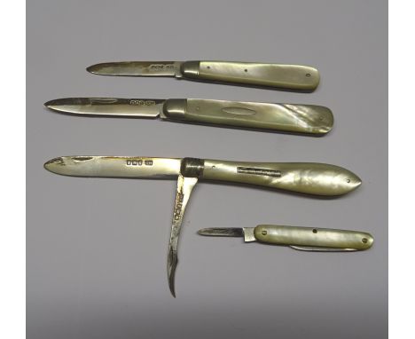 A late Victorian silver and mother of pearl double bladed Fruit Knife, Sheffield, 1899, two others and another with plated bl
