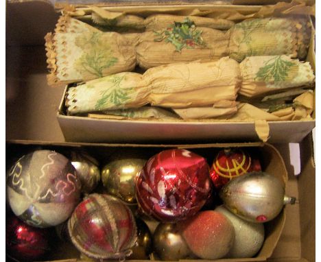 A box of vintage Christmas Decorations and crackers. 