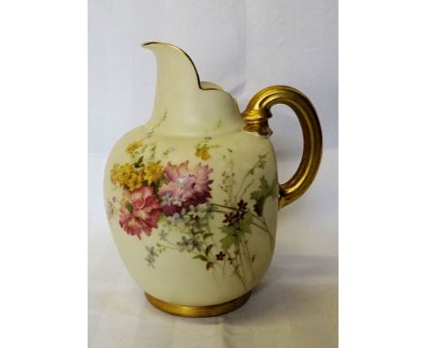 A Royal Worcester Jug decorated with sprays of flowers, with gilded handle on a blush ivory ground, date code for 1897.  8" (