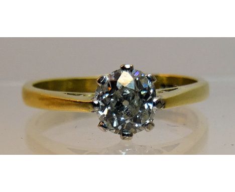 Another 18ct. gold solitaire diamond Ring with double claw setting.