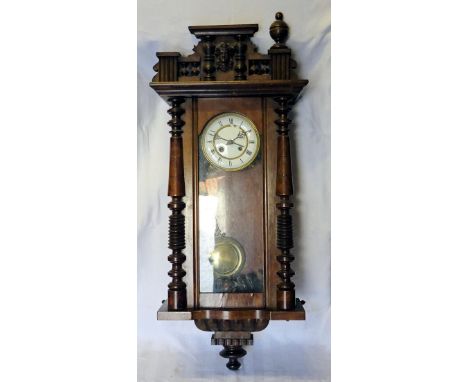 A Vienna Wall Clock with white dial in architectural with glazed door.  34" (87cms) high.  