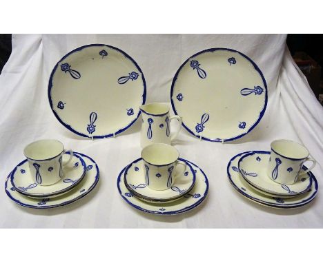 A Barker Brothers Teaset of Art Nouveau design, decorated with stylised flowers in blue and white, comprising twelve cups and