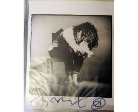 A black ring binder and contents of Signed Photographs including Bob Geldof, Lesley Garrett, Frankie Howerd etc.