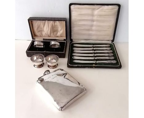 An American silver hip flask by Howard &amp; Co., New York, 15.5  x 11 cm, 10.5 oz, with inscription, some dents, cork/hinge 