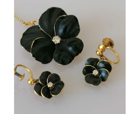 A Victorian gold and black enamel mourning brooch with matching earrings and diamond decoration in the form pansies, largest 