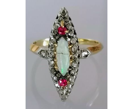 A Belle Epoque opal, ruby and diamond ring in a yellow metal setting, the central marquise-cut cabochon opal (split) 5mm, sho