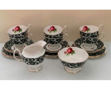 A Royal Albert black lace Senorita tea set comprising six cups/saucers/side plates, sugar bowl and cream jug, all without vis