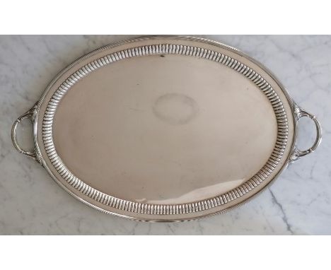 An Edwardian silver two-handled butler's tray with reeded and gadroon border by William Hutton &amp; Sons Ltd, London, 1907, 