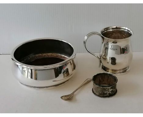 A George V silver tankard by Atkin Brothers, Sheffield, 8 cm H, 1918, slight dent; a silver napkin ring, together 163g and a 