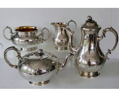 A Victorian silver four-piece tea and coffee service of bulbous form with etched floral and foliate decoration, ivory insulat