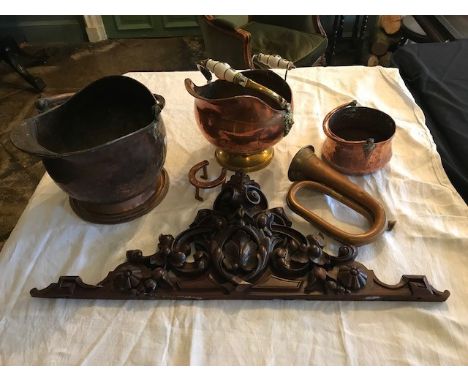 A late 19th Century decorative carved mahogany scroll pediment, width 80cm (repairs), with two copper coal hods, bugle etc (p