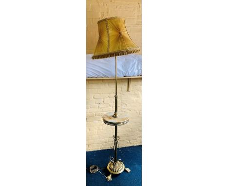 A 20th Century brass and marble floor standing lamp, turned column united with a central marble platform, standing on a tripo