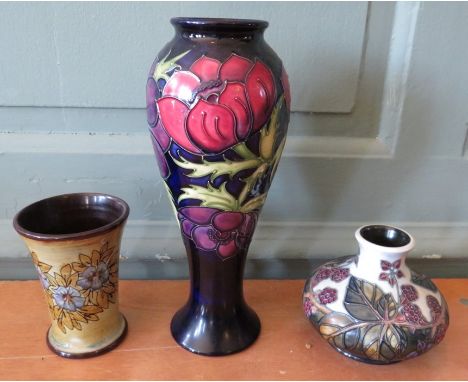 Two Moorcroft vases together with a Chelsea pottery ceramic vase. (3)