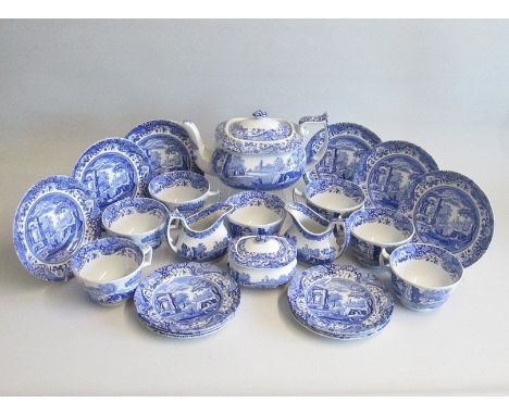 A Spode Blue and white Pottery “Italian” Tea Set Six  Breakfast cups and saucers, six small plates, two milk/cream jugs, suga