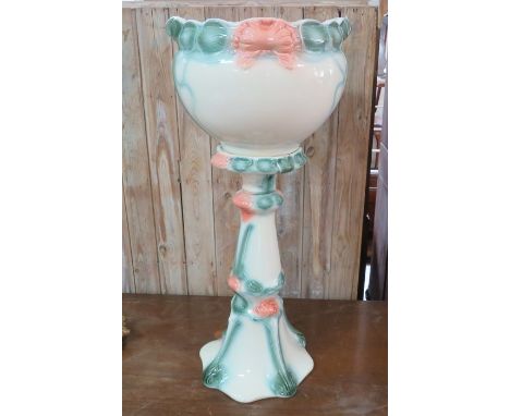 A modern ceramic art nouveau style jardiniere and stand. 89 cm tall. In good overall condition.&nbsp;