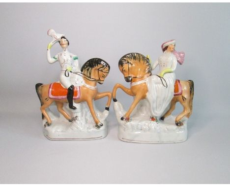 A Rare Pair of Staffordshire Figure of Queen Victoria and Prince Albert on HorsebackDate  circa 1840Size   Victoria  20cm dia