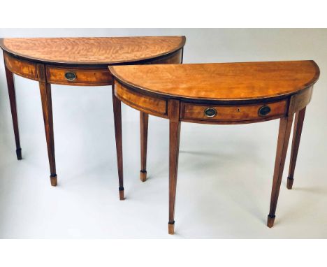 CONSOLE TABLES, a pair, English early 19th century George III satinwood and line inlaid of semicircular outline each with fri