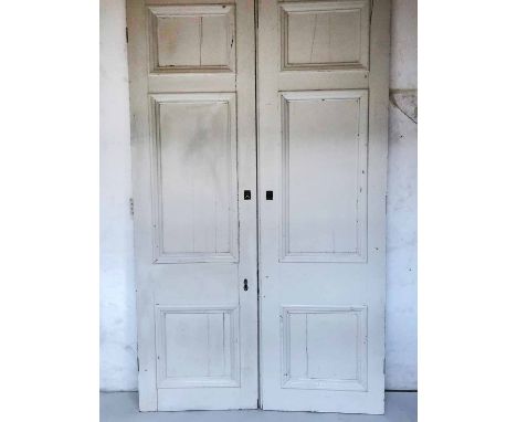 DOORS, a pair, salvage early 20th century mahogany distressed white painted each with three panels, 72cm x 240cm H. (2)