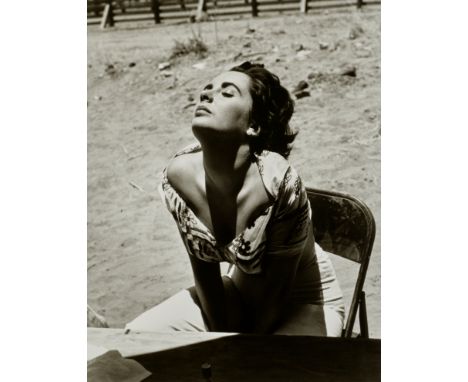 Sid Avery (1918-2002)Elizabeth Taylor Sunning Herself on the Set of 'Giant', Marfa, Texas, 1955Gelatin silver print, printed 