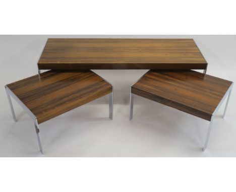 A Merrow Associates rosewood nest of three tables with chrome frames, 38cm high x 123cm wide x 45cm deep (CITES certificate n