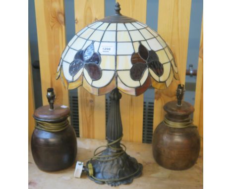 A Tiffany style table lamp,  two other table lamps, four shades and a mirror (8) Condition Report: Available upon request